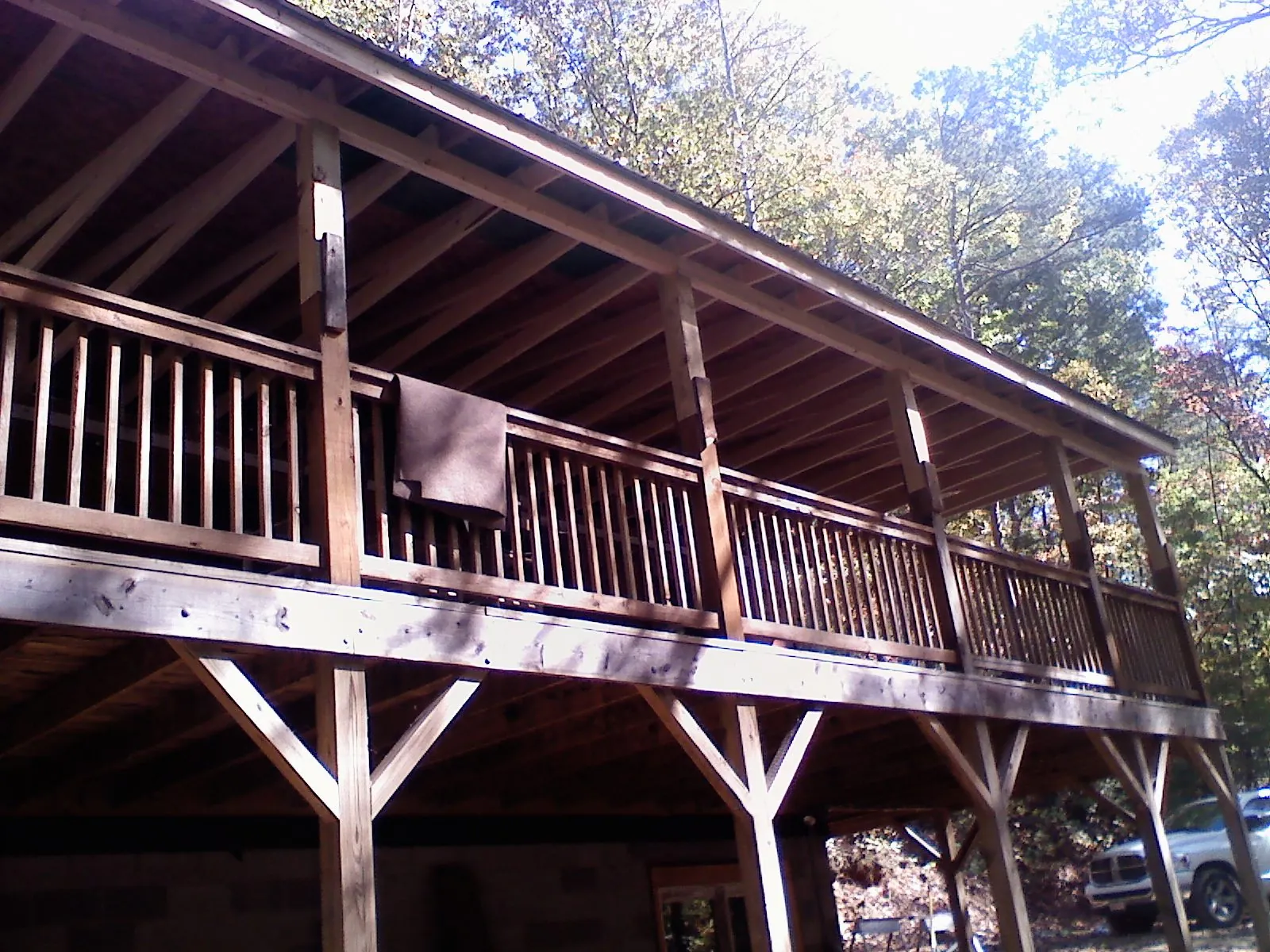 Timber framing under a new elevated porch and deck — Roof Leak Repair in Terre Haute by Roofing Brothers
